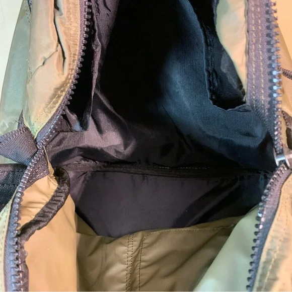 Guess Green Messenger Bag with Adjustable Strap and zipper pockets